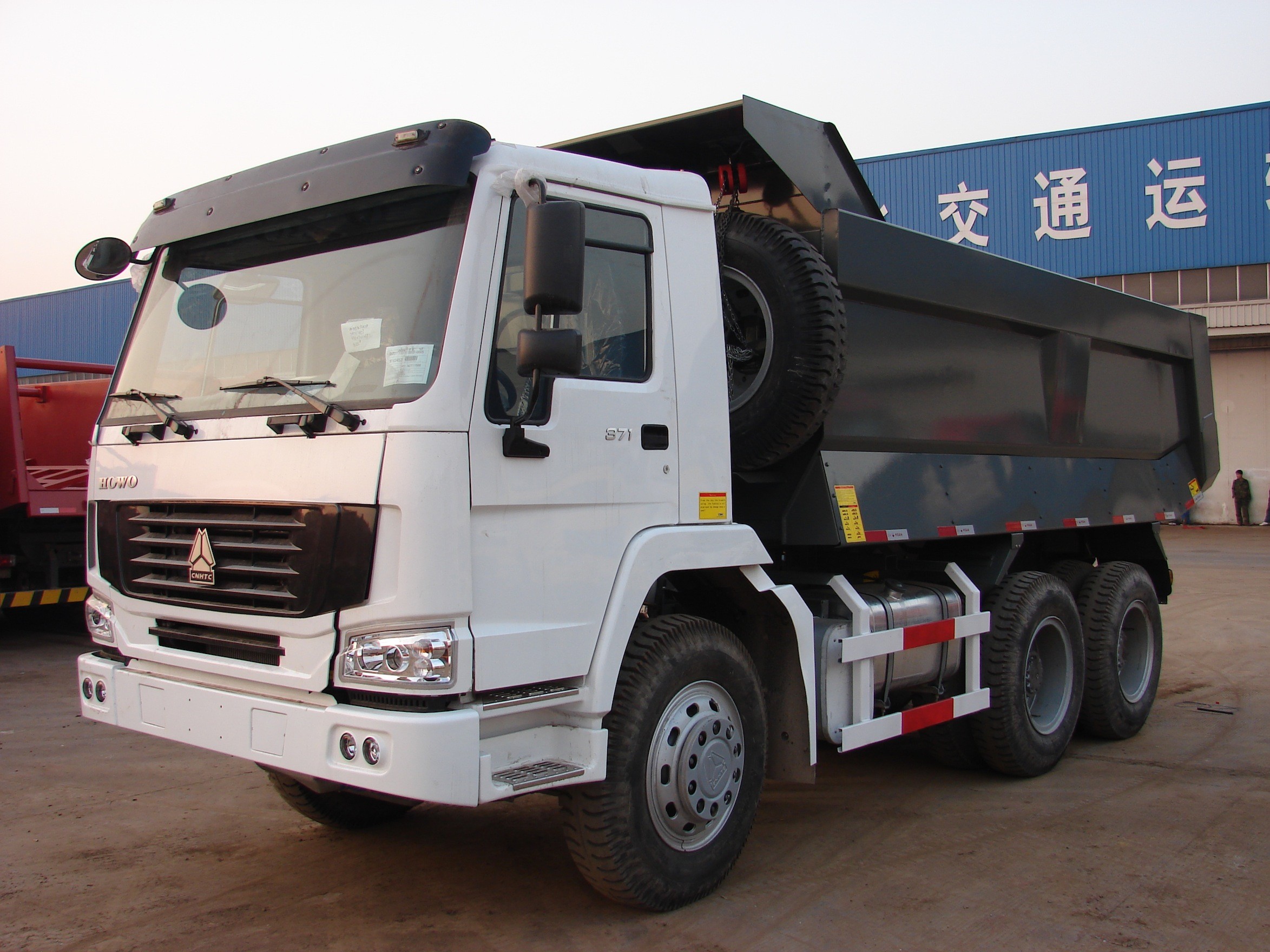 China Dump Truck Howo Tipper Vietnam Mud Road Condition wholesale