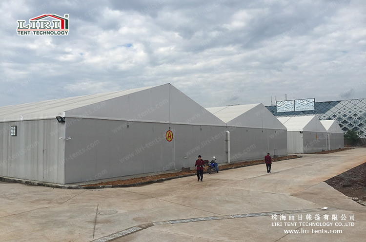 China 2000 sqm 6m Side Height Alucminum Storage Warehouse Tent With Sandwich Hard Walls wholesale