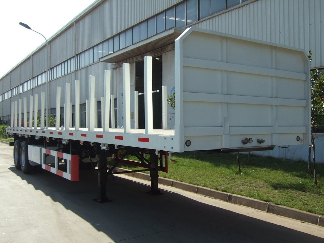 China 40 feet,3 axles,leaf spring suspension,twin tires,Log holder Carbon Steel Flat Bed Container Semi-Trailer  9453TJZPL wholesale