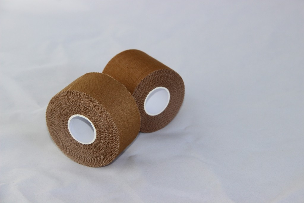 China Tan Colored Rayon Cloth Rayon Tape / Sports Strapping Tape With Strong Porous Zinc Oxide wholesale