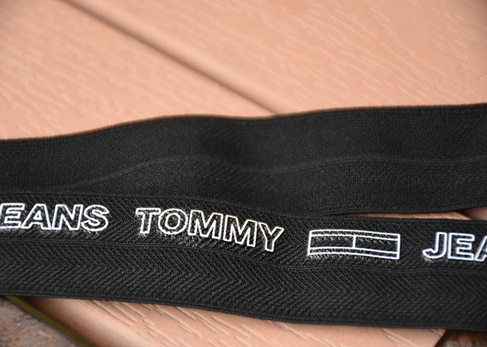 China 2cm Black Elastic Webbing Straps Printed With White Cut Out Letters Logo wholesale