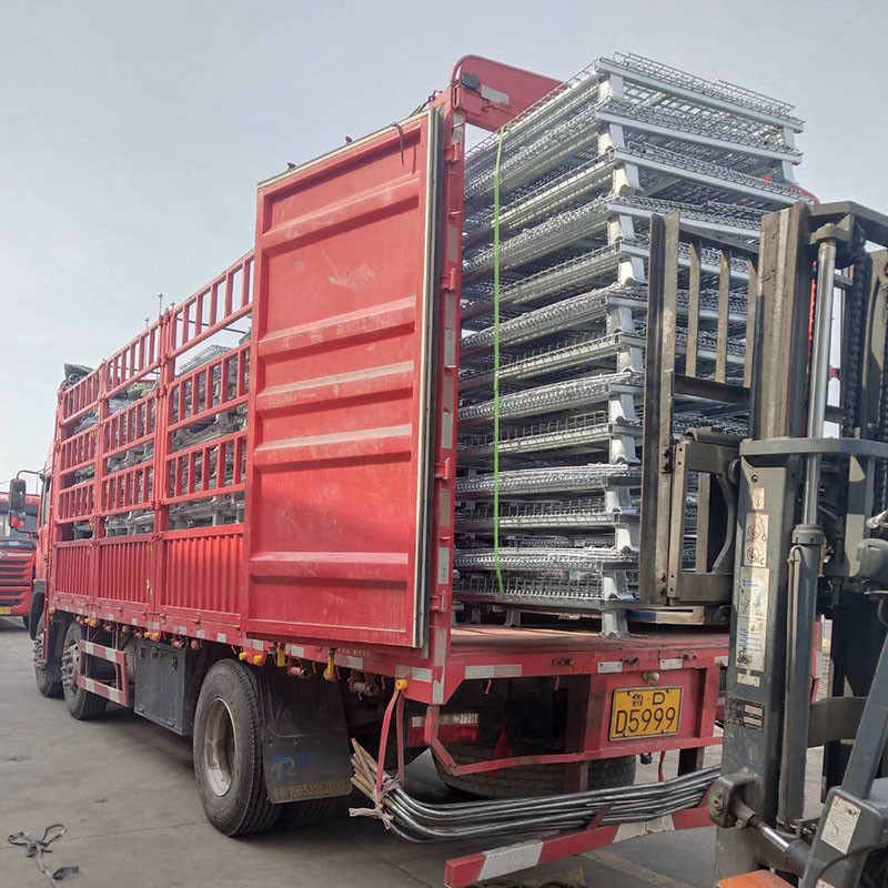 Multiple storage cages in warehouse aisle