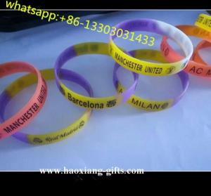 China cheap custom silicone bracelets no minimum with debossed color slicone wristbands on sale