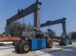 Mobile Straddle Transporter To Lift And Store Wind Tower Sections With Spreader
