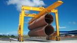 Mobile Straddle Transporter To Lift And Store Wind Tower Sections With Spreader
