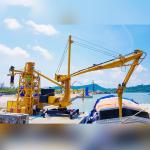 Compact screw ship unloader applied to unload cement at seaport