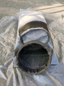 China Alkaline Resistance Fibreglass Filter Bag Cement Plant Use High Temperature wholesale