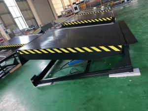 China Security Loading Dock Leveler Cargo Handling Equipment With Hold Down Function wholesale