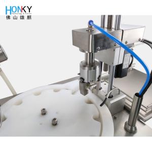 China Desktop Essential Automatic Filling And Capping Machine With Servo Motor Capping System For Glass Bottle Packing on sale