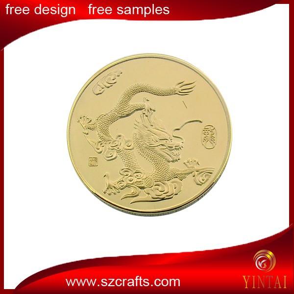 Fake gold coin with tungsten maple leaf logo
