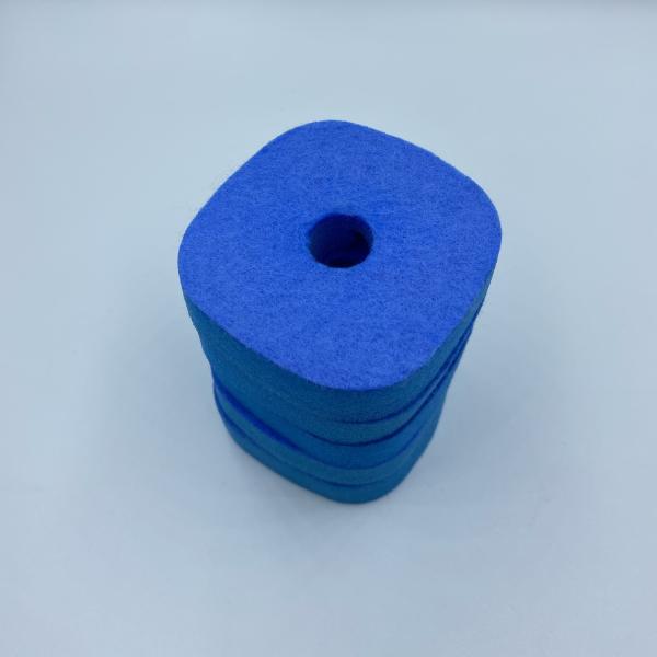 Disposable scrubber close-up showing texture
