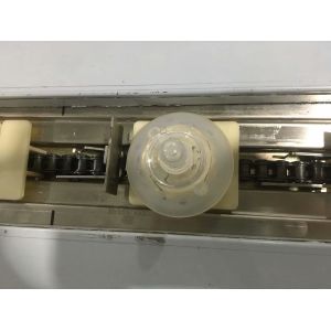 low cost automatic retail nipple wrapping capobilities/nipple packing machine