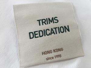 China Cotton Thread Brocade Woven Clothing Labels Beige Background High Density on sale