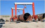 Mobile Straddle Transporter To Lift And Store Wind Tower Sections With Spreader