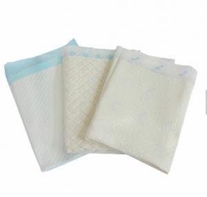 China Sanitary Embossed 5cm Hospital Bed Protector Pads on sale
