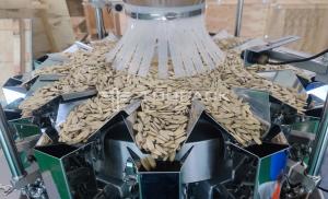 China Vertical Vffs Melon Seeds Weighing Packing Machine Sunflower Seeds Sweet Snacks Bagging Machine wholesale