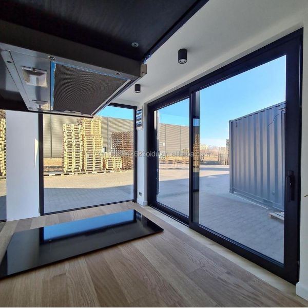 One Bedroom Hotel Black Shipping Container House Steel Door Luxury 20ft Prefabricated Wooden Houses with Kitchen and Bathroom